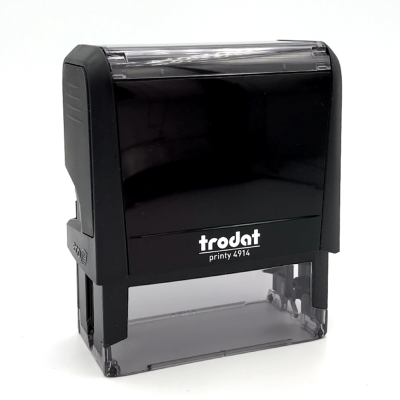 Custom self-inking rubber stamp with a clean printed impression beside it